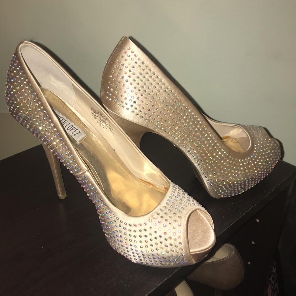 Blinged out platform peep toe heels